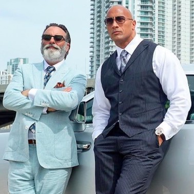Keep the swag - working from home. Two men looking good in suits